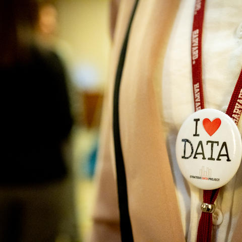 I heart data button and suit