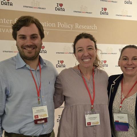 Attendees at convening in front of the SDP step-and-repeat