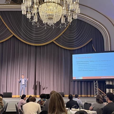 Mainstage presenter speaking at convening